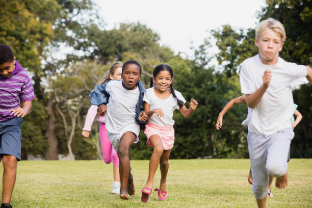 istock Kids playing together during a sunny day 663849724