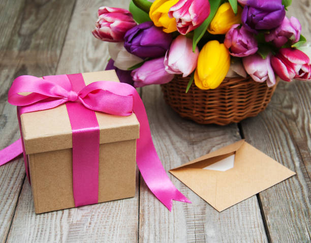 istock Spring tulips flowers and gift box 663853298