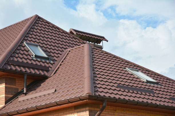 istock Modern house roofing construction with attic skylights, rain gutter system, roof windows, roof  exterior. Multilevel roof with attic skylights. Waterproofing  roofing construction area. 663864140