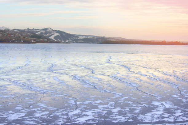 istock mountain and frozen river 663864338