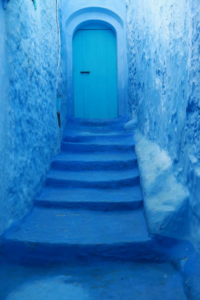 istock Narrow blue street 663870162