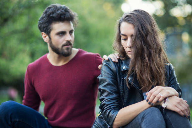 istock A couple having a dialogue in the park 663874160