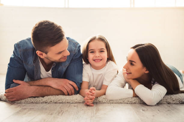 istock Happy young family 663874642