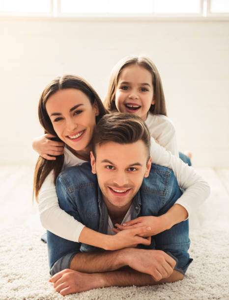 istock Happy young family 663877936