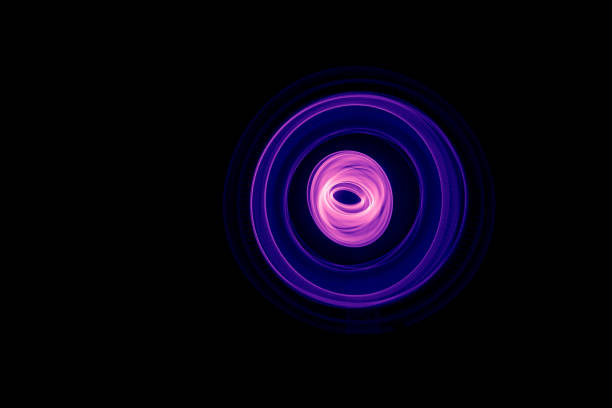 istock Glowing abstract curved blue and magenta lines 663884176