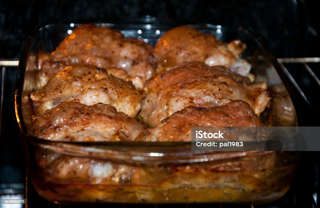 drumstick chicken chicken drumsticks baked in a glass form in the oven. crisp. spices. the boiling oil. Appetizer Stock Photo