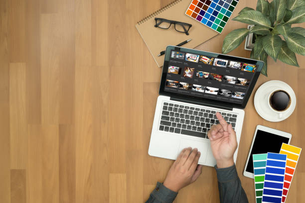 istock Creative Designer Graphic at work. Color swatch samples, Illustrator Graphic designer working digital tablet and computer 663887686