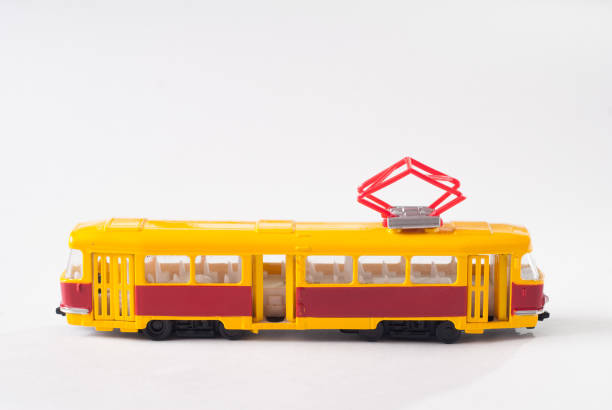 istock Toy tram in yellow on white background, 663888134