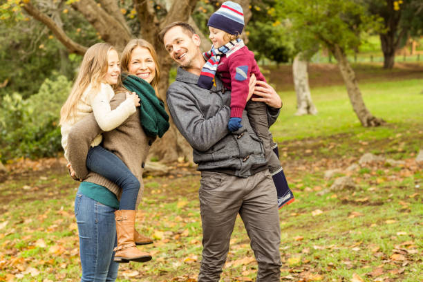 istock Smiling young family looking each other 663893730
