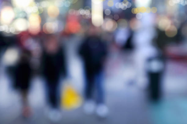 istock Blurred Motion people on busy street 663895324