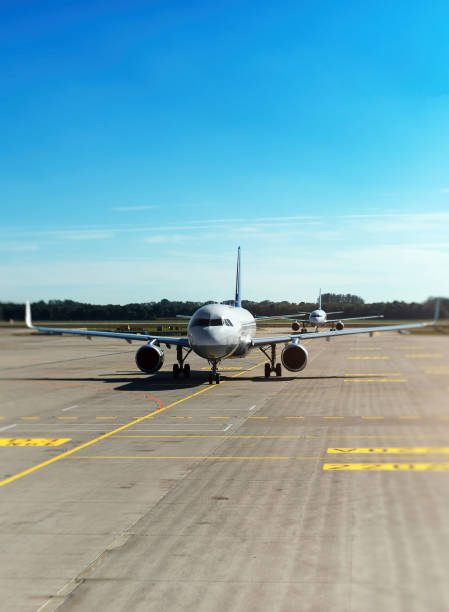 istock Two passenger planes heading to the airport. 663901178