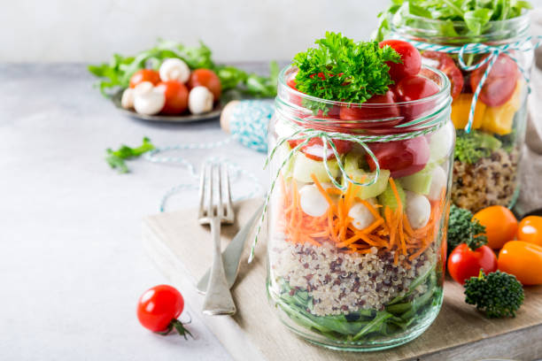 istock Salad in glass jar with quinoa 663905928