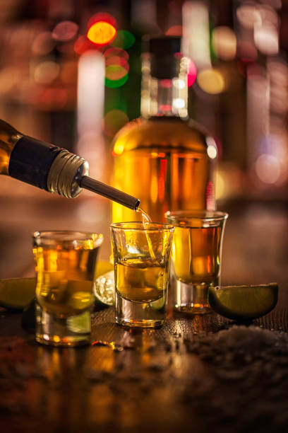Tequila Shots with Lime Tequila Shots with Lime and Salt tequila slammer stock pictures, royalty-free photos & images