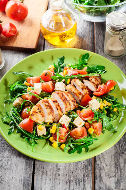 istock Fresh salad with chicken breast, arugula and tomato 663910304
