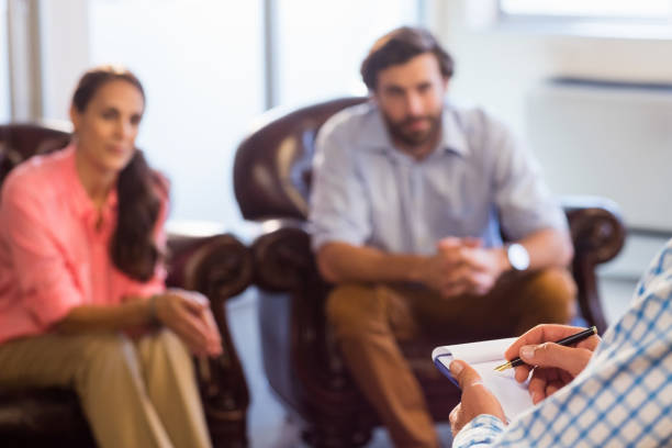istock Psychologist helping a couple with relationship difficulties 663917404