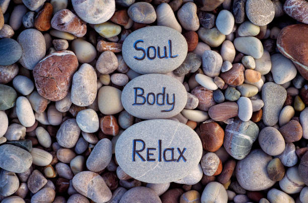 istock Words Soul, Body and Relax written on stones 663921786