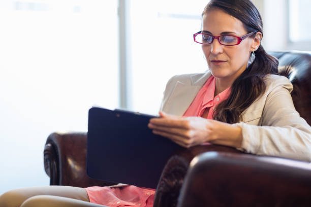 istock Concentrated psychologist woman 663925512