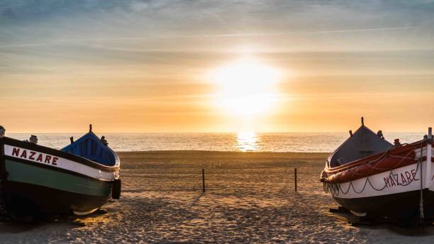istock Fishing boats on Nazare Beach 663929198