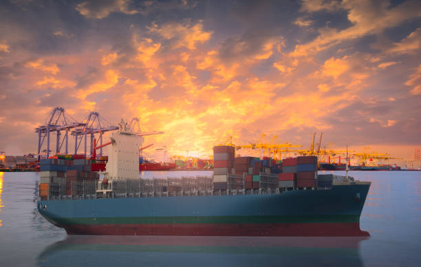 istock Logistics and transportation of Container Cargo ship and Cargo plane with working crane bridge in shipyard at Twilight sky, logistic import export background and transport industry. 663932538