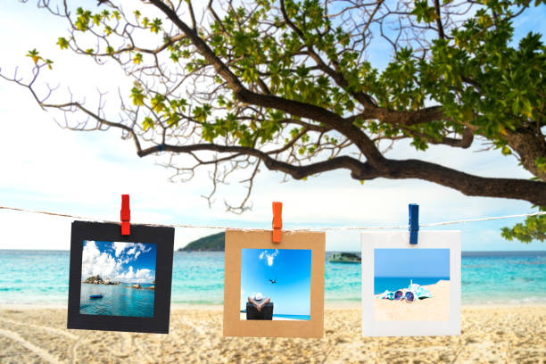 istock Vacation photos hanging on a rope 663932674
