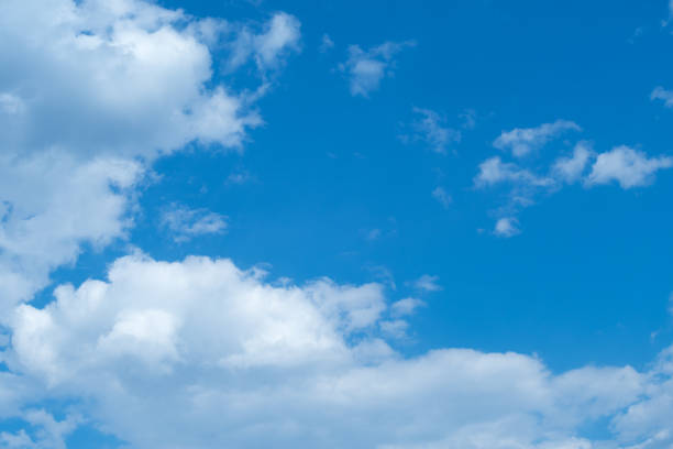istock White heap clouds in the blue sky at the summer day.with copy space. 663937368