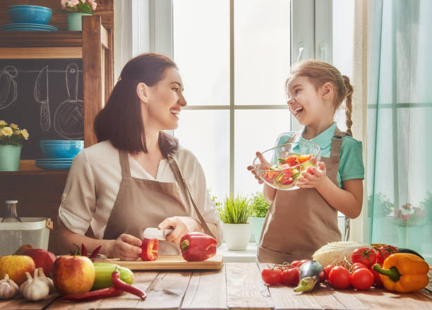 istock Happy family in the kitchen. 663948194