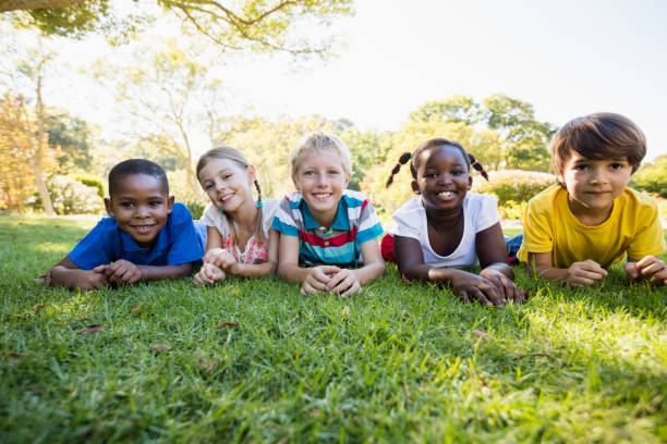 istock Kids posing together during a sunny day at camera 663952272