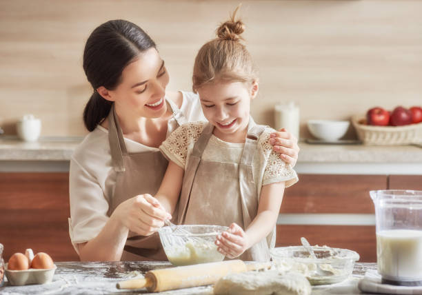 homemade food and little helper. - little cakes imagens e fotografias de stock