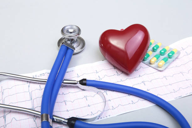 istock RX prescription, Red heart, asorted pils and a stethoscope on white background 663958300