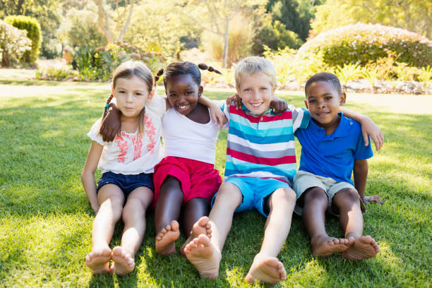 istock Kids posing together during a sunny day at camera 663958522
