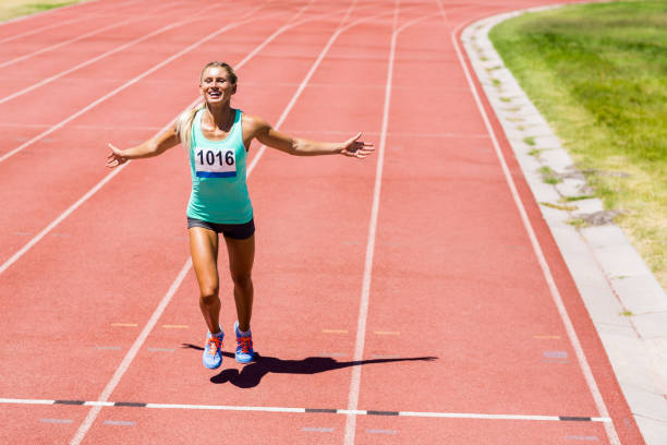 istock Excited female athlete posing after a victory 663959854