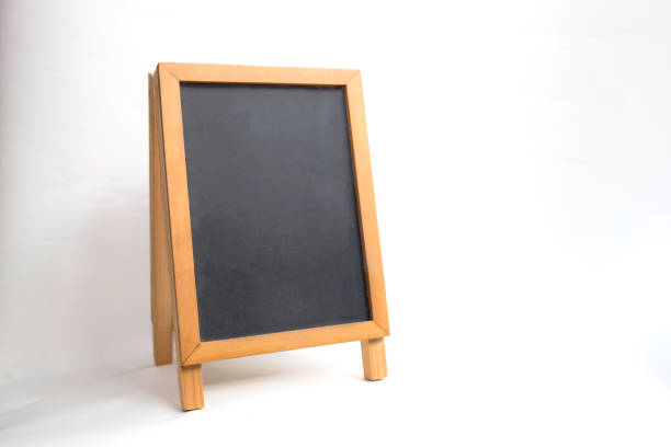 istock wood black board isolated on white background with clipping path 663962496