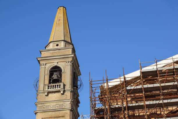 istock Extensive scaffolding providing platforms for work in progress on a church in restructuring 663963204