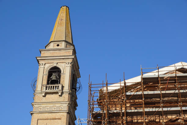 istock Extensive scaffolding providing platforms for work in progress on a church in restructuring 663963362