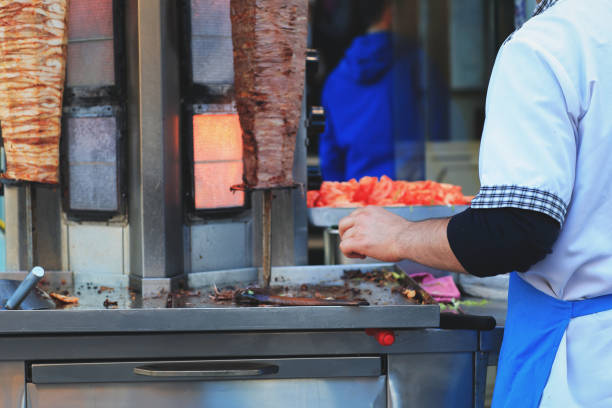 Doner kebab is a Turkish dish made of meat cooked on a vertical rotisserie, normally lamb but also a mixture of veal or beef with these, or sometimes chicken.