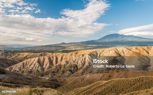 Badlands In The Countryside Of Sicily Near Biancavilla Volcano Etna In The Background Stock Photo - Download Image Now