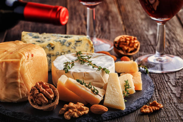 istock Cheese, nuts, honey and red wine 663977964
