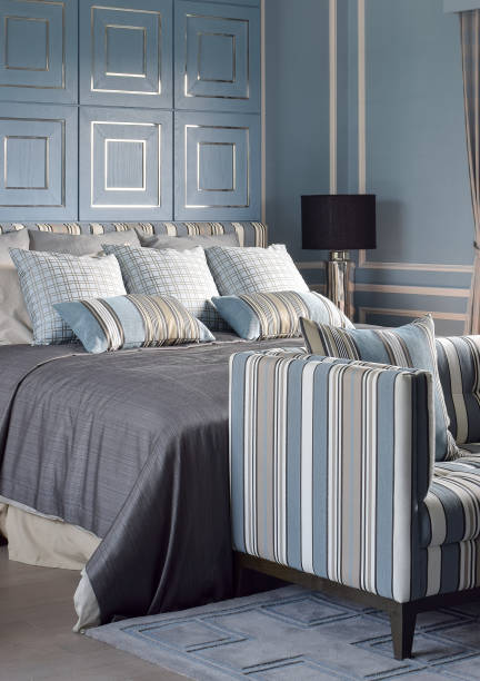 istock Light blue romantic style bedroom with reading lamp and comfortable sofa 663978746