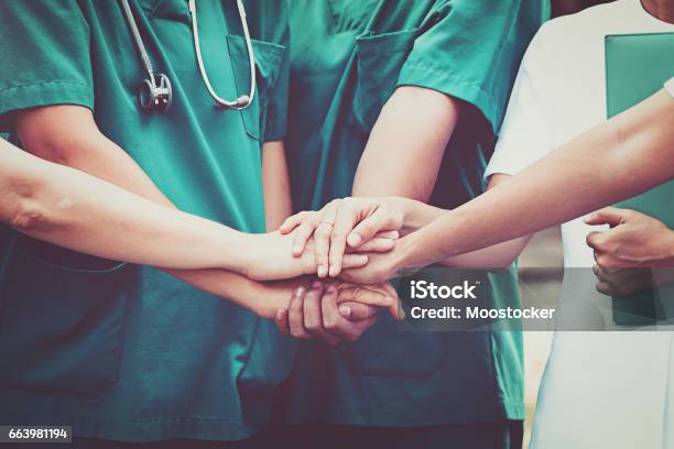 Doctors And Nurses Coordinate Hands Concept Teamwork Stock Photo - Download Image Now