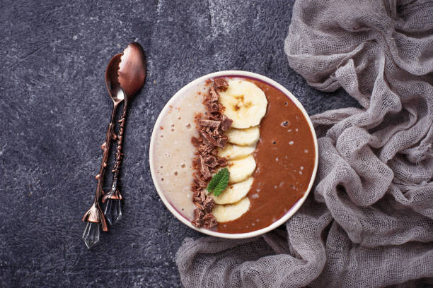 istock Banana and chocolate smoothie bowl 663981926