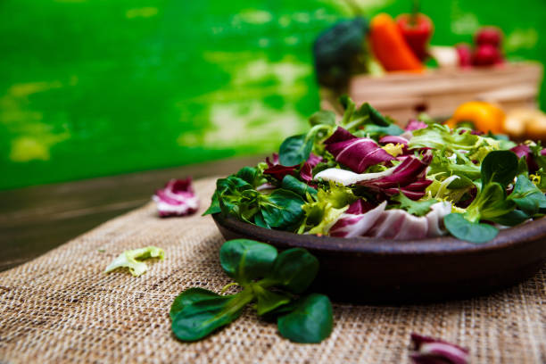 istock Endive, lamb and rose salad. Vegetables. 663984732