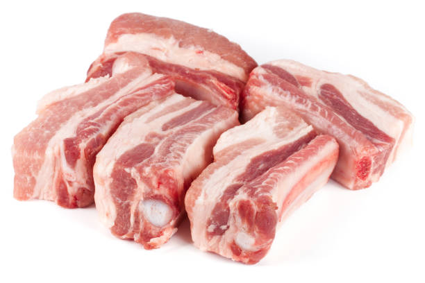 istock pieces of pork isolated on white background 663985456