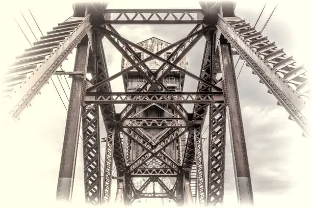 A detail of historic railroad Katy Bridge  over Missouri River at Boonville with a lifted midsection, retro opalotype processing
