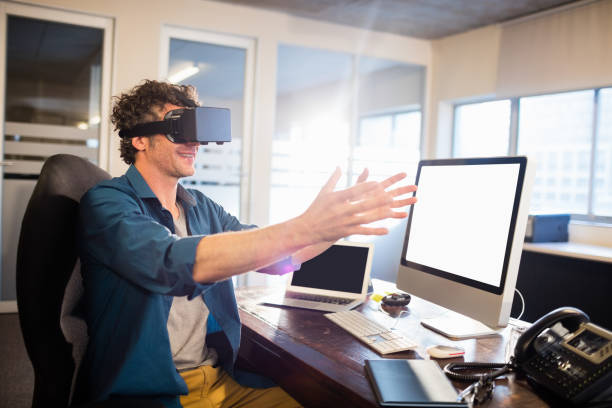istock Businessman wearing virtual glasses 663997866