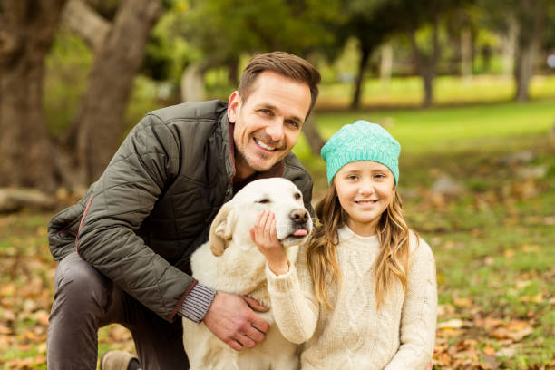 istock Young family with a dog 664000006