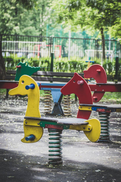 istock Wooden horses with spring in the park 664000344