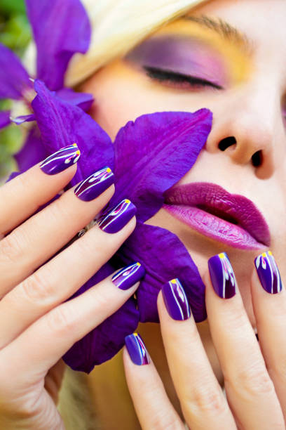 istock Summer purple yellow makeup and manicure. 664007134