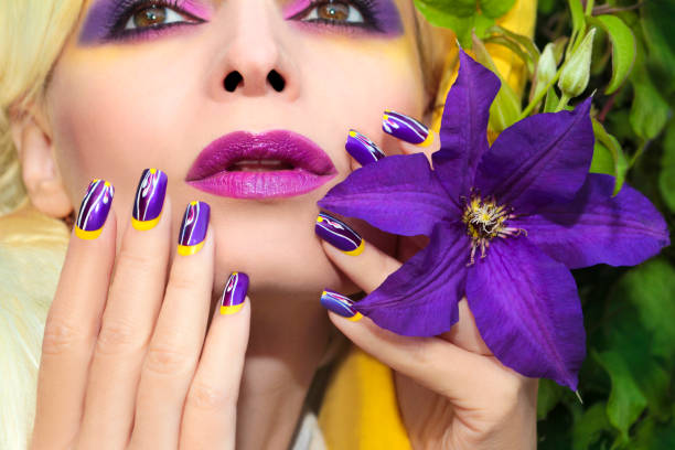 istock Summer purple yellow makeup and manicure. 664007164