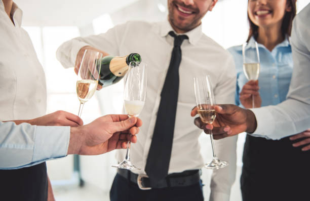 istock Business people celebrating 664007262