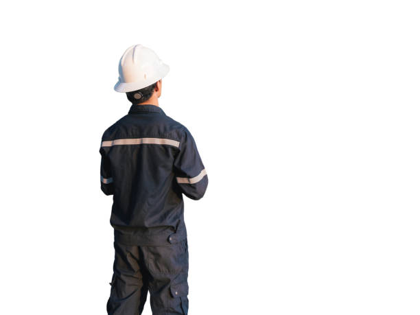 istock Engineer or Technician in white helmet, glasses and blue working shirt suit using a digital tablet, isolated on white, Electricity a 664007452